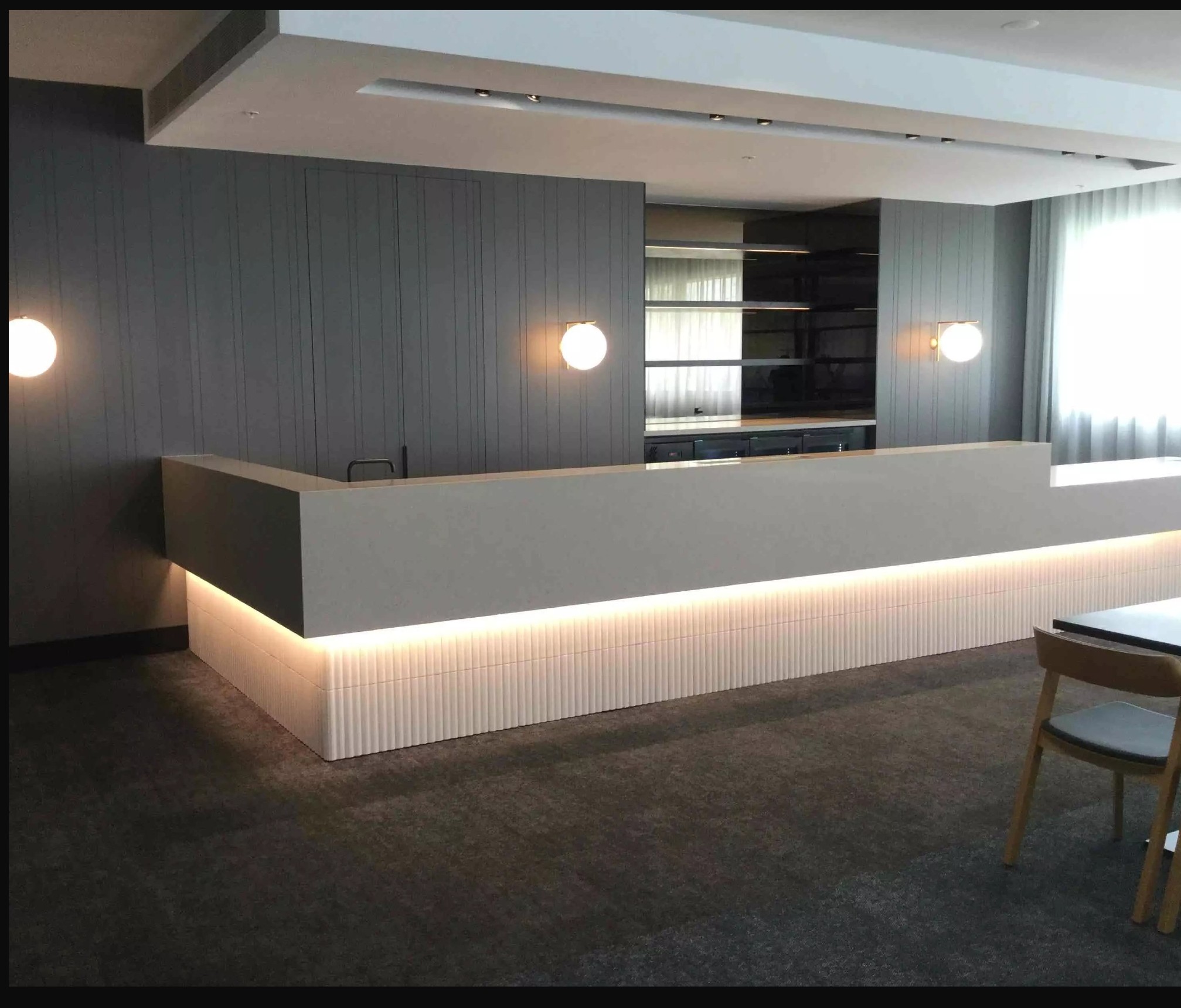 Modern commercial interior with feature lighting installed by IVR Electrical Solutions
